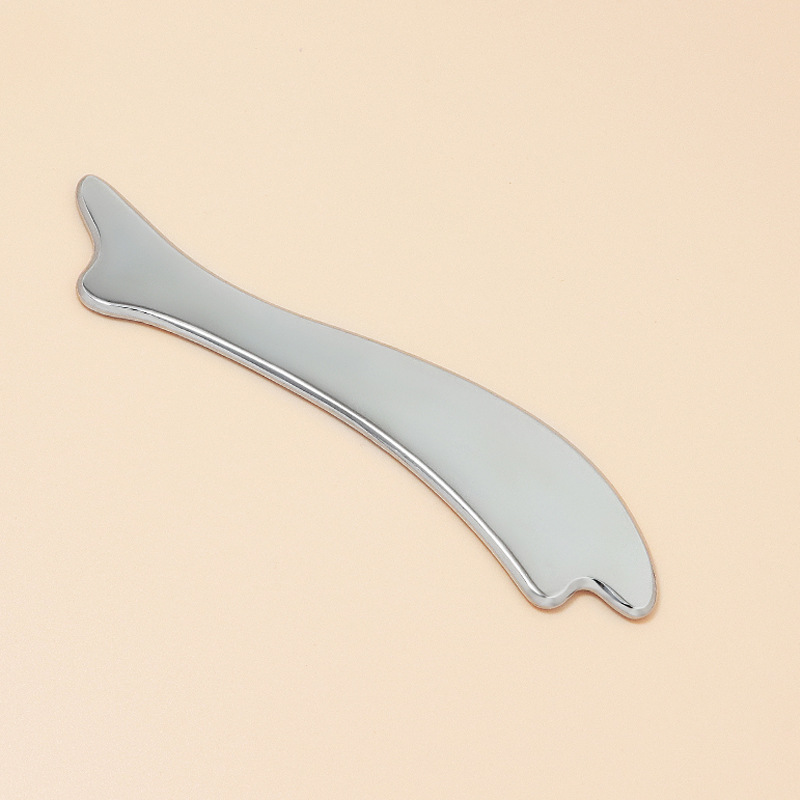 Fiskformad zinklegering Gua Sha-bräda med personliga färger och logotyp Fiskformad zinklegering Gua Sha-bräda med personliga färger och logotyp