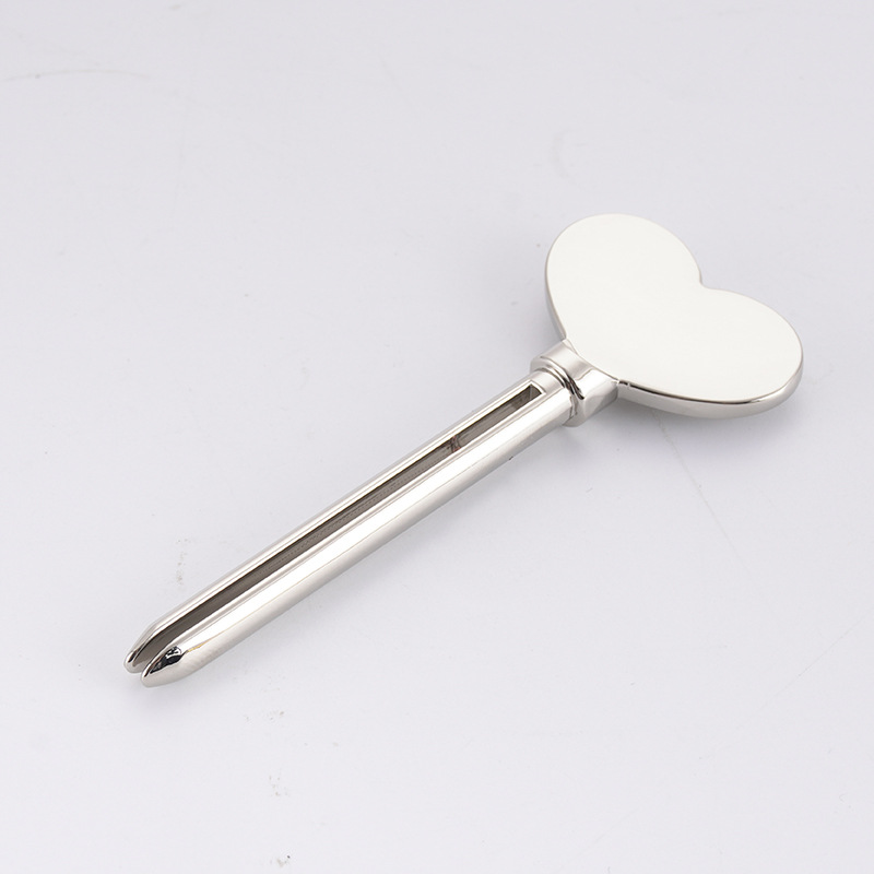 Metal Tandkräm Dispenser Ansiktsrengöring Tandkräm Tube Squeezer Nyckelform Kosmetika Tube Squeezer