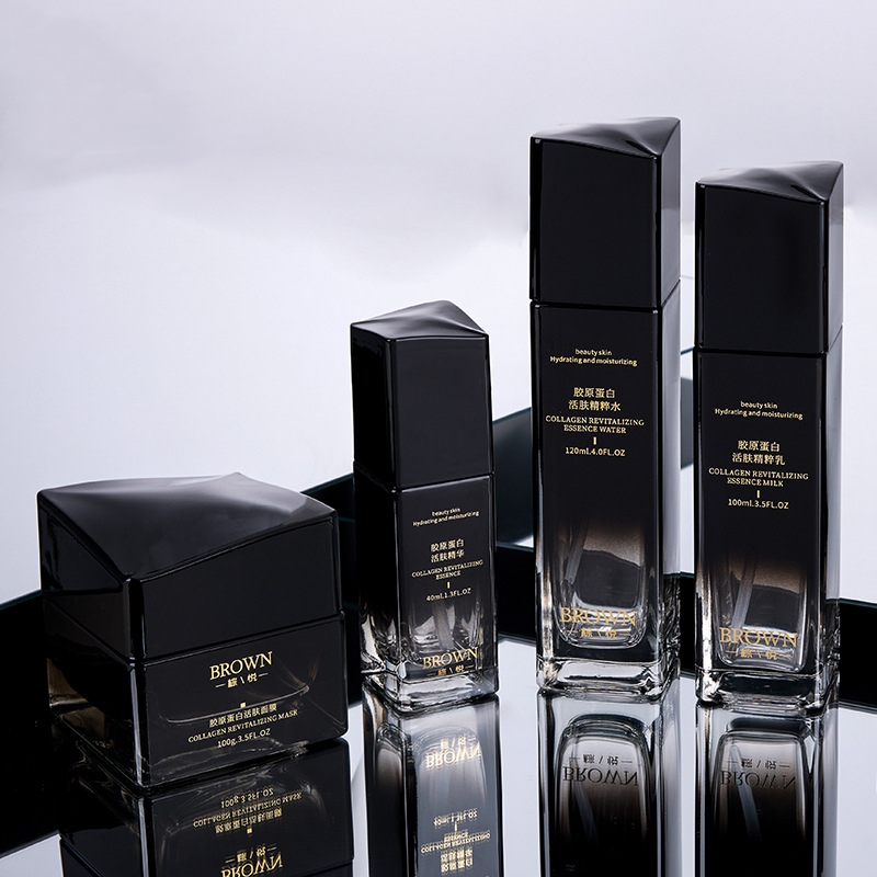 Unik fyrkantig krämburk i glas med höjt lockdesign för kosmetiska förpackningar