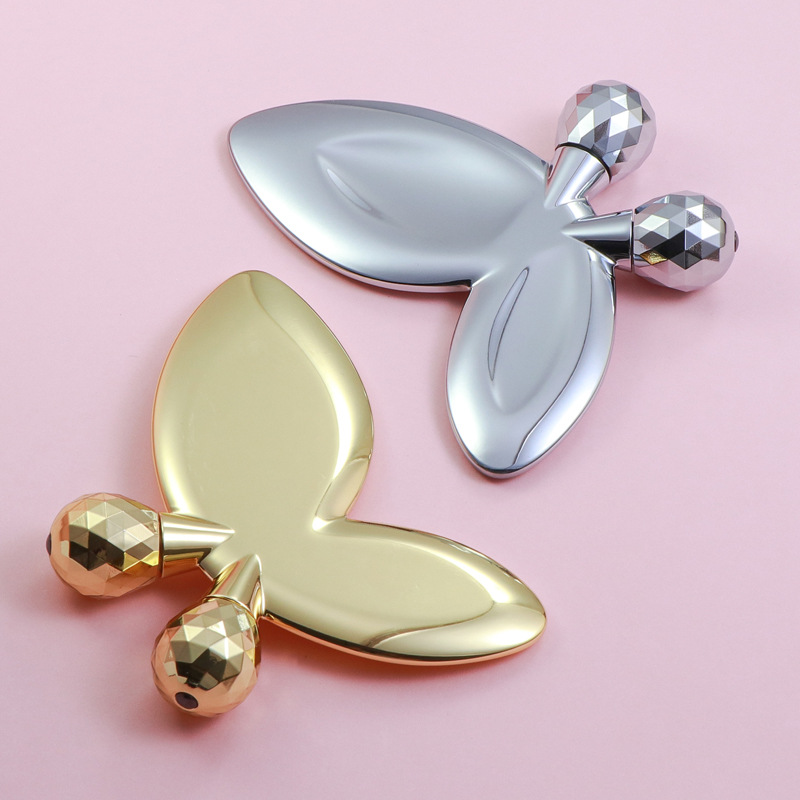 Zinklegering fjärilsformad ansiktsmassagerulle