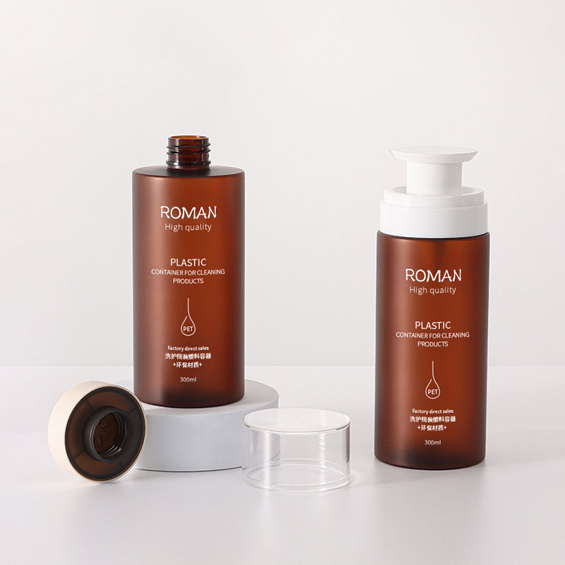 Plastflaskor med pumpdispenser Läcksäker Stor tom klar bärnstensfärgad cylinder Återfyllningsbar för schampo hårbalsam Lotion oljor
