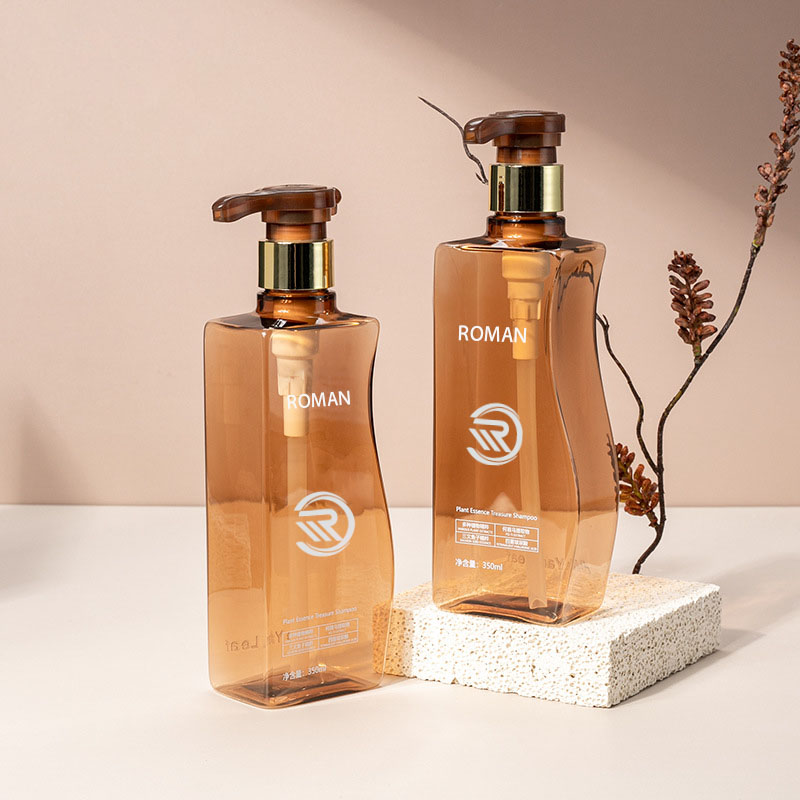 Pålitlig 350 ml 500 ml kurvformad bärnstensfärgad husdjursplast Tom Body Lotion-flaska med pump för hårvård Schampobalsam eller ansiktskrämanvändning