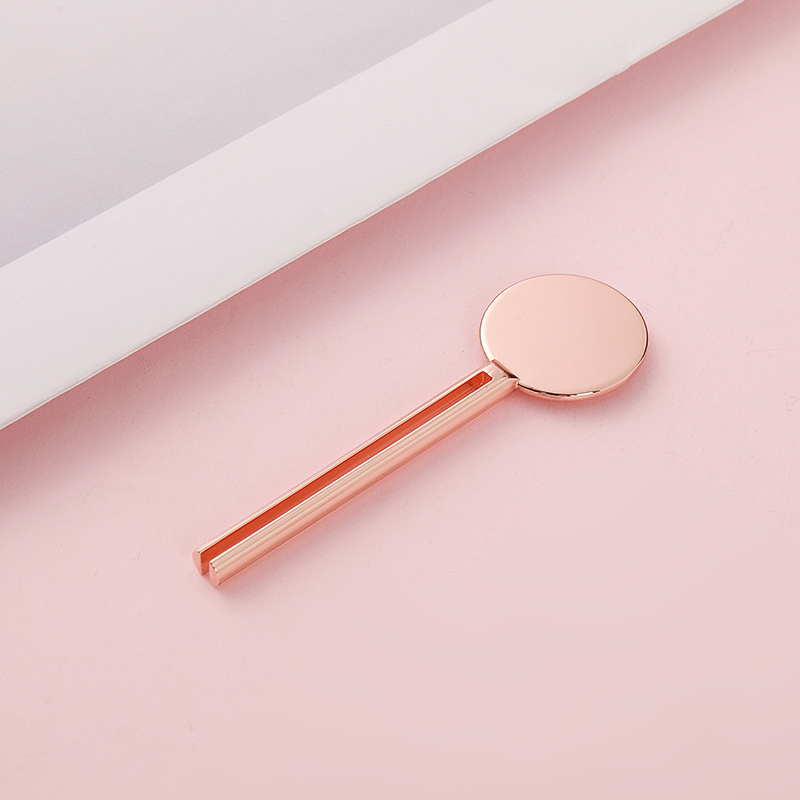 Kosmetisk nyckelformad tubvridare Rullande tandkräm Tubepressnyckel med stativ Dispenser metalltubpressare Kosmetisk nyckelformad tubvridare Rullande tandkräm Tubepressnyckel med stativ Dispenser metalltubpressare