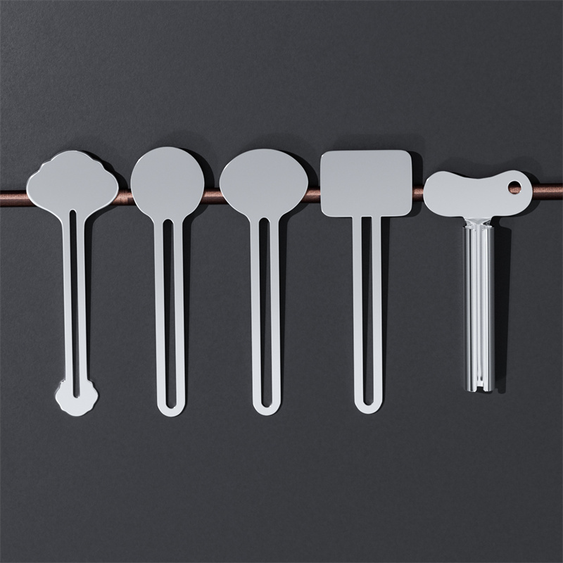 Metalltandkrämspressare Rostfritt stålrörspressare Key Roller Tube Krämer Färgpressverktyg för familjens toalett badrum