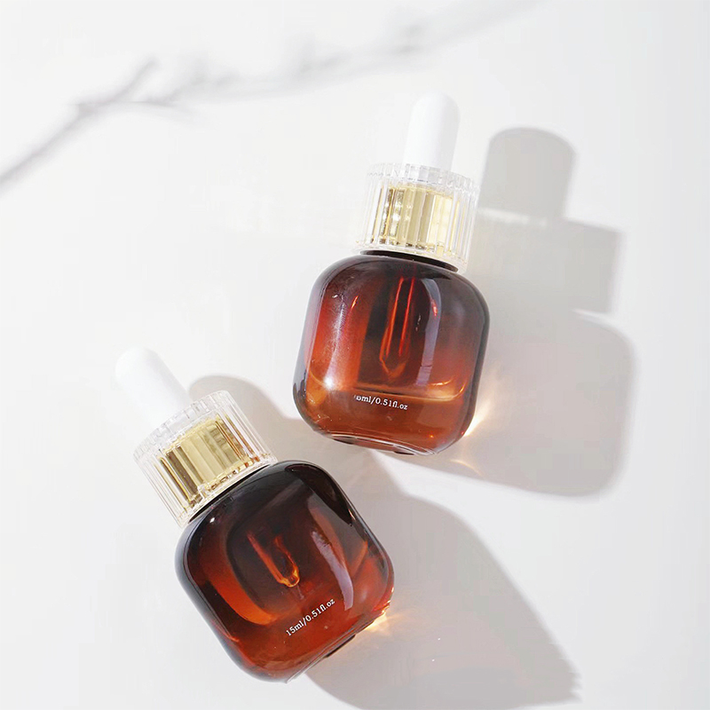 Vilka är de olika typerna av kosmetiska glasflaskor och hur väljer du rätt för din produkt?